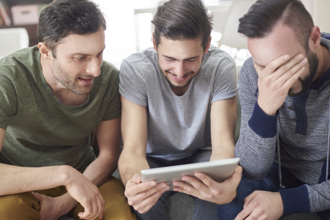 Exploring the Benefits of an LMS for Online Course Instructors friends browsing photos from their old times